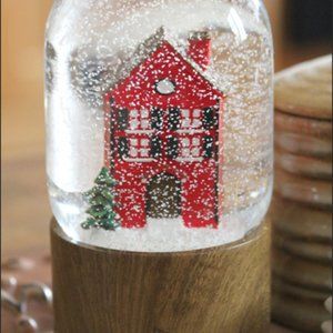 Home in the Snow Snowglobe musical - Here Comes Santa Claus wind-up red house